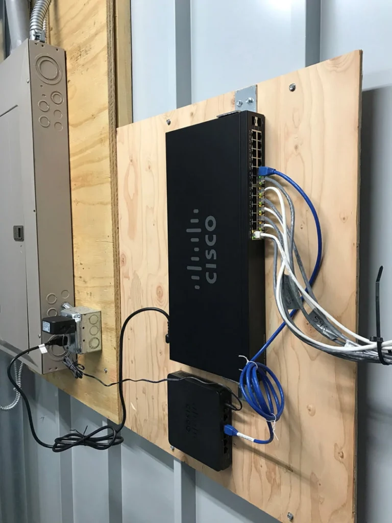 This wall mounted router and PoE switch provide power and data connection to an entire building’s worth of cameras connected to the video recorder (up to 300 feet away) by a single cat5 cable.