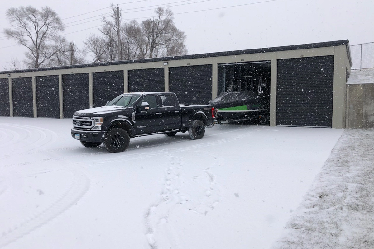 West Circle storage unit with truck backing boat into it