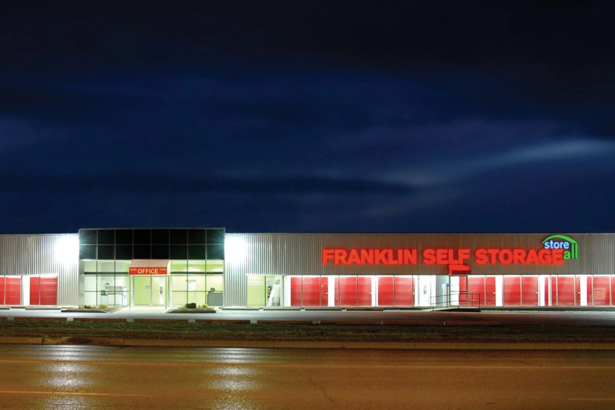 Franklin self storage building exterior at night