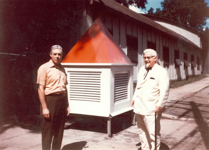 two men outside of storage facility in 1968