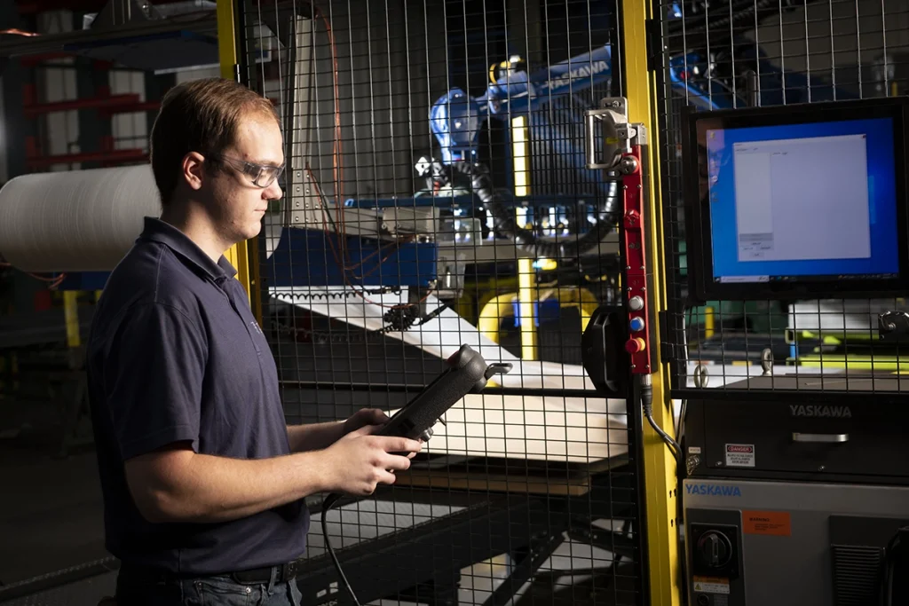 man in lab testing products