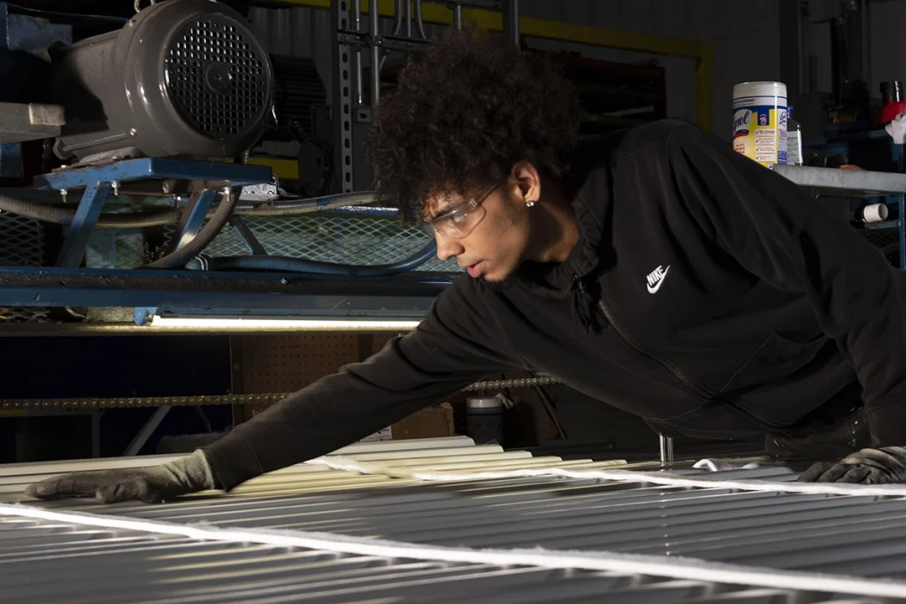 young man testing product quality